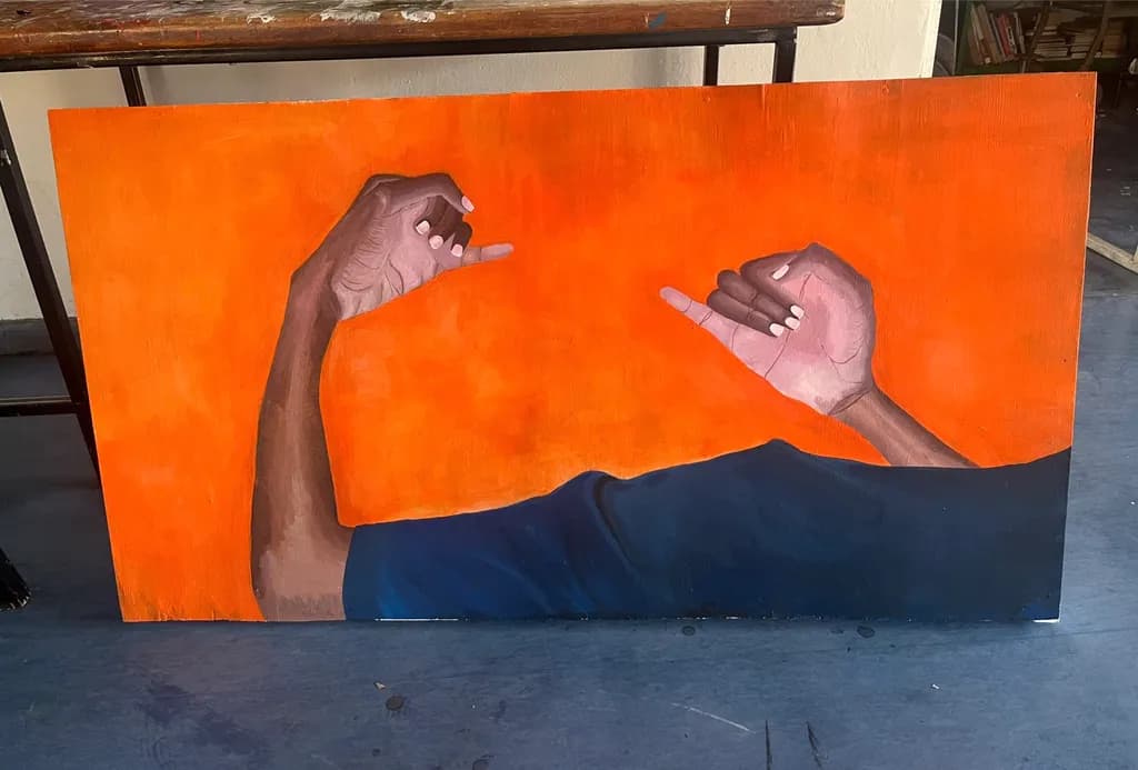 Hands Against Orange