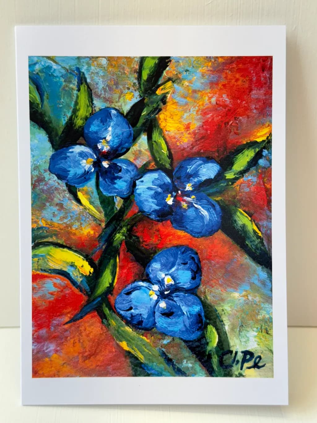 Blue Flowers on Red Canvas