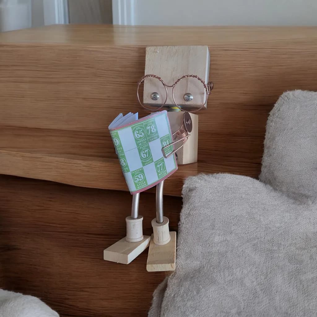 Wooden Figurine Reading