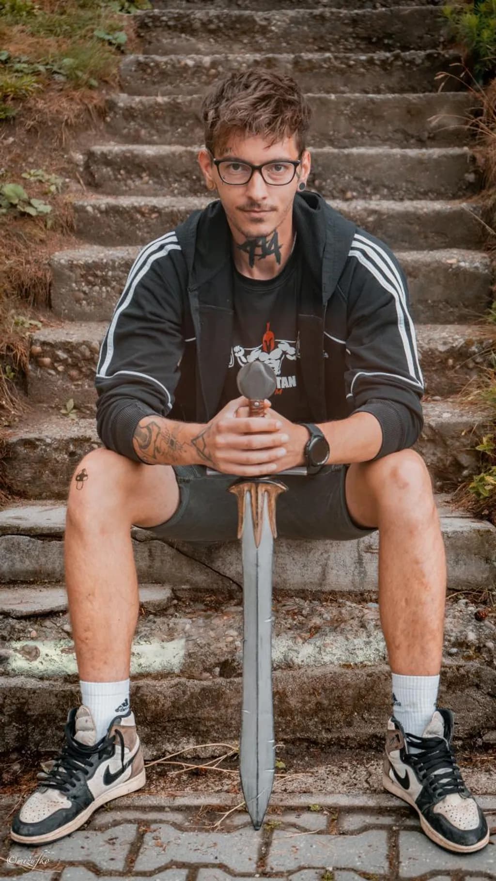 Man with Sword on Steps