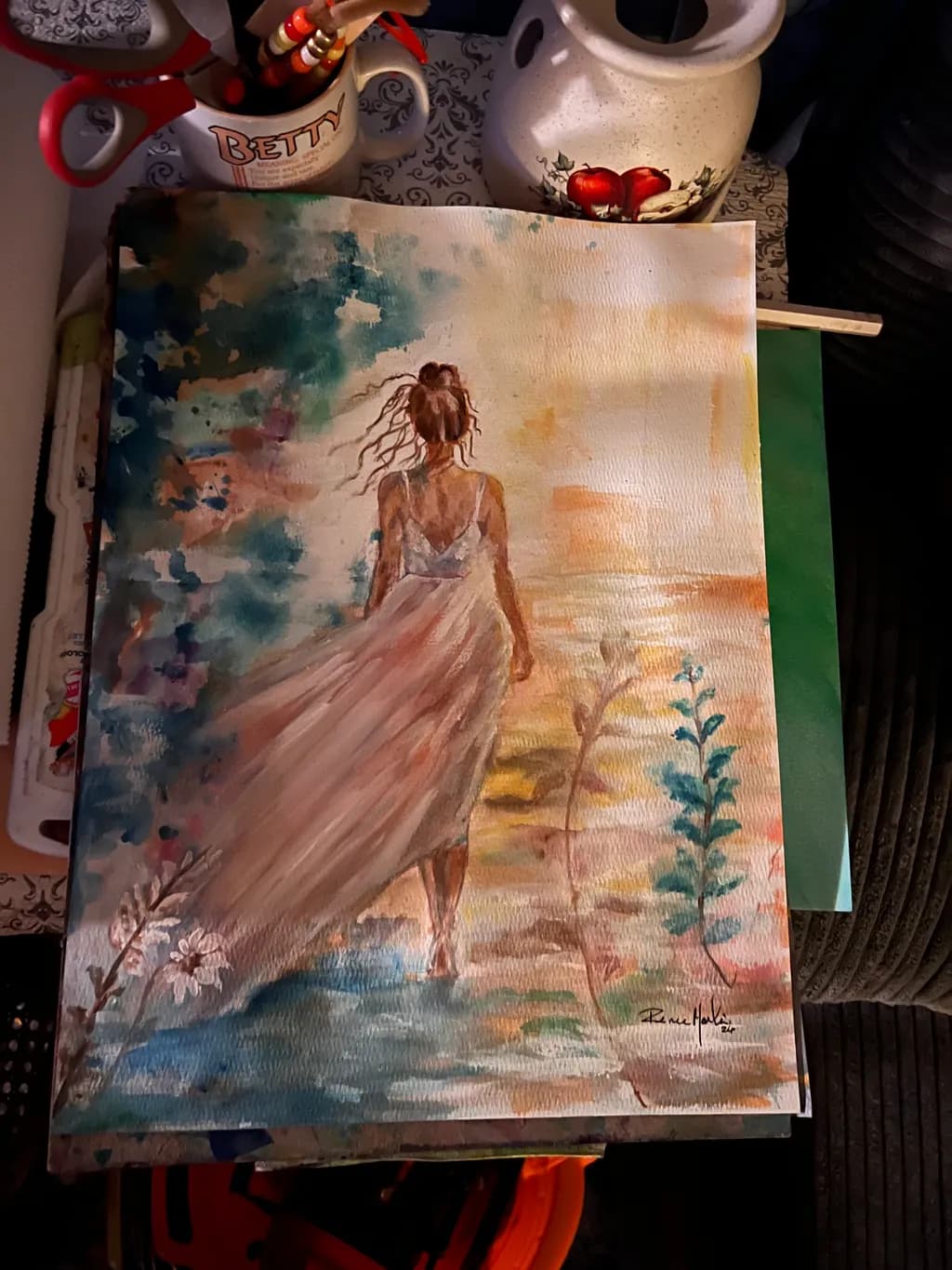 Woman Walking Through Garden
