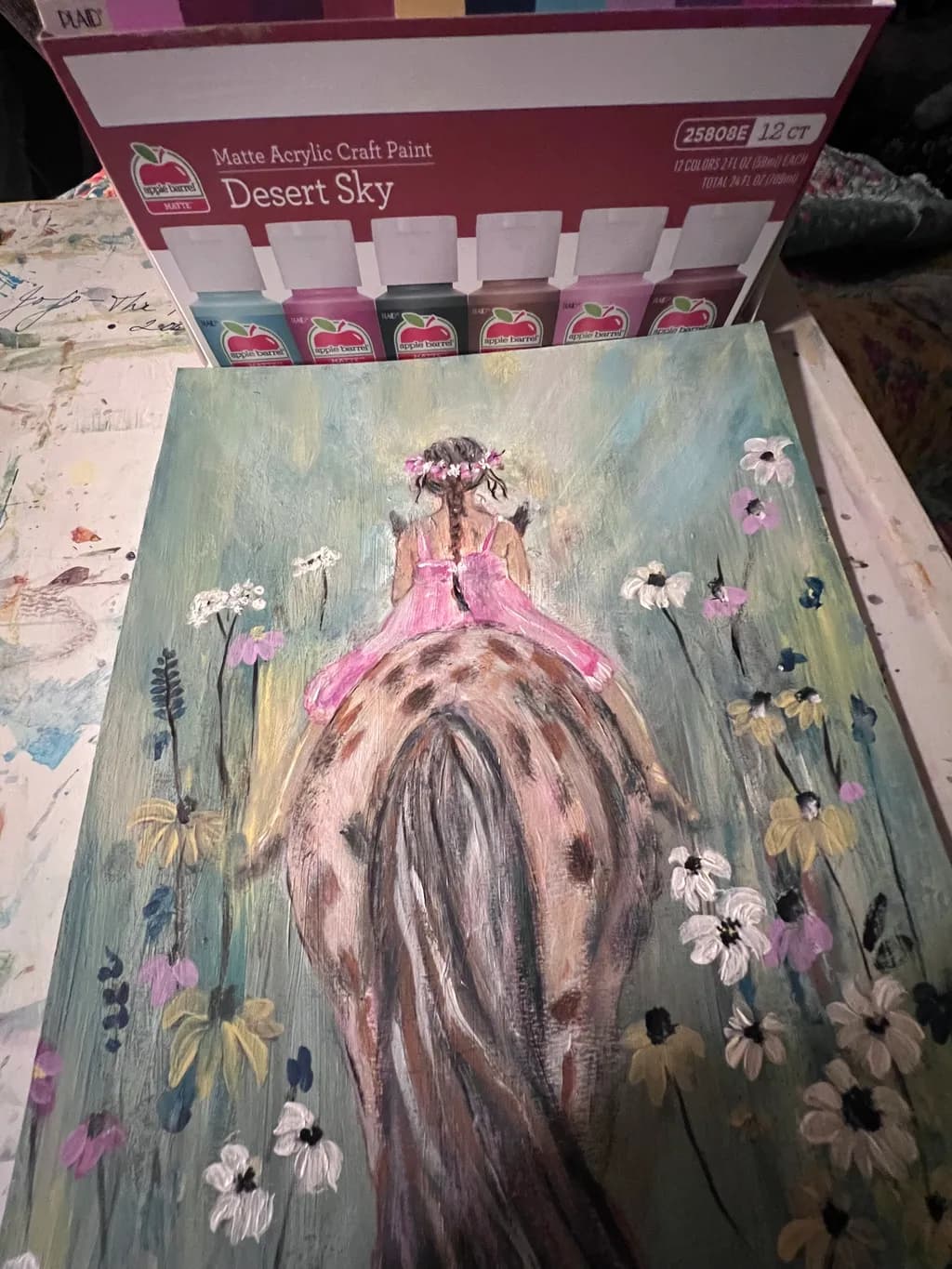 Girl on Horseback with Flowers