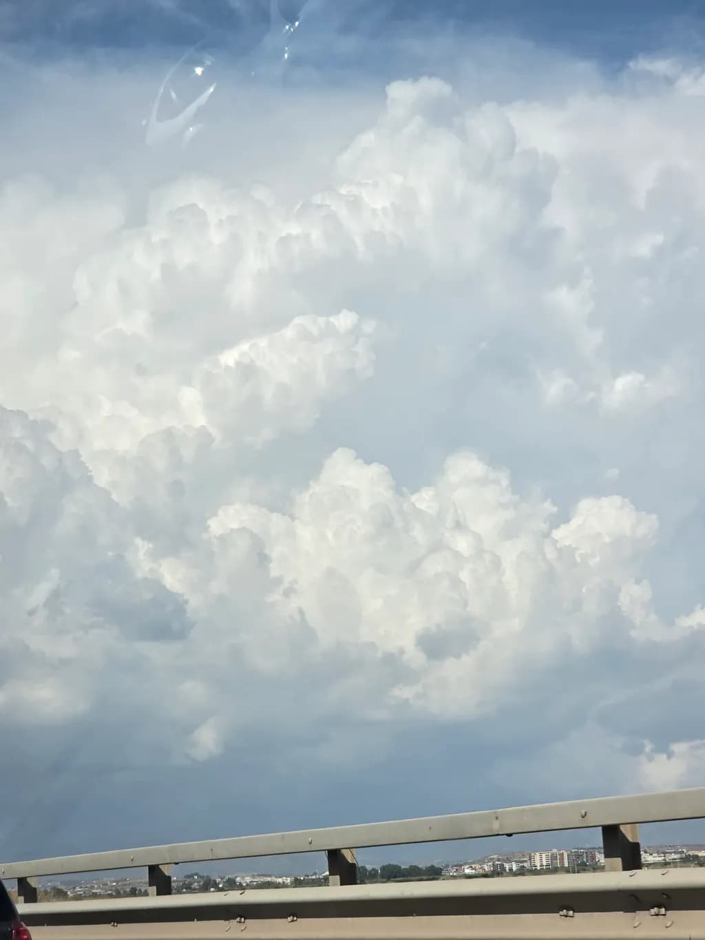 Inbound Clouds Over City