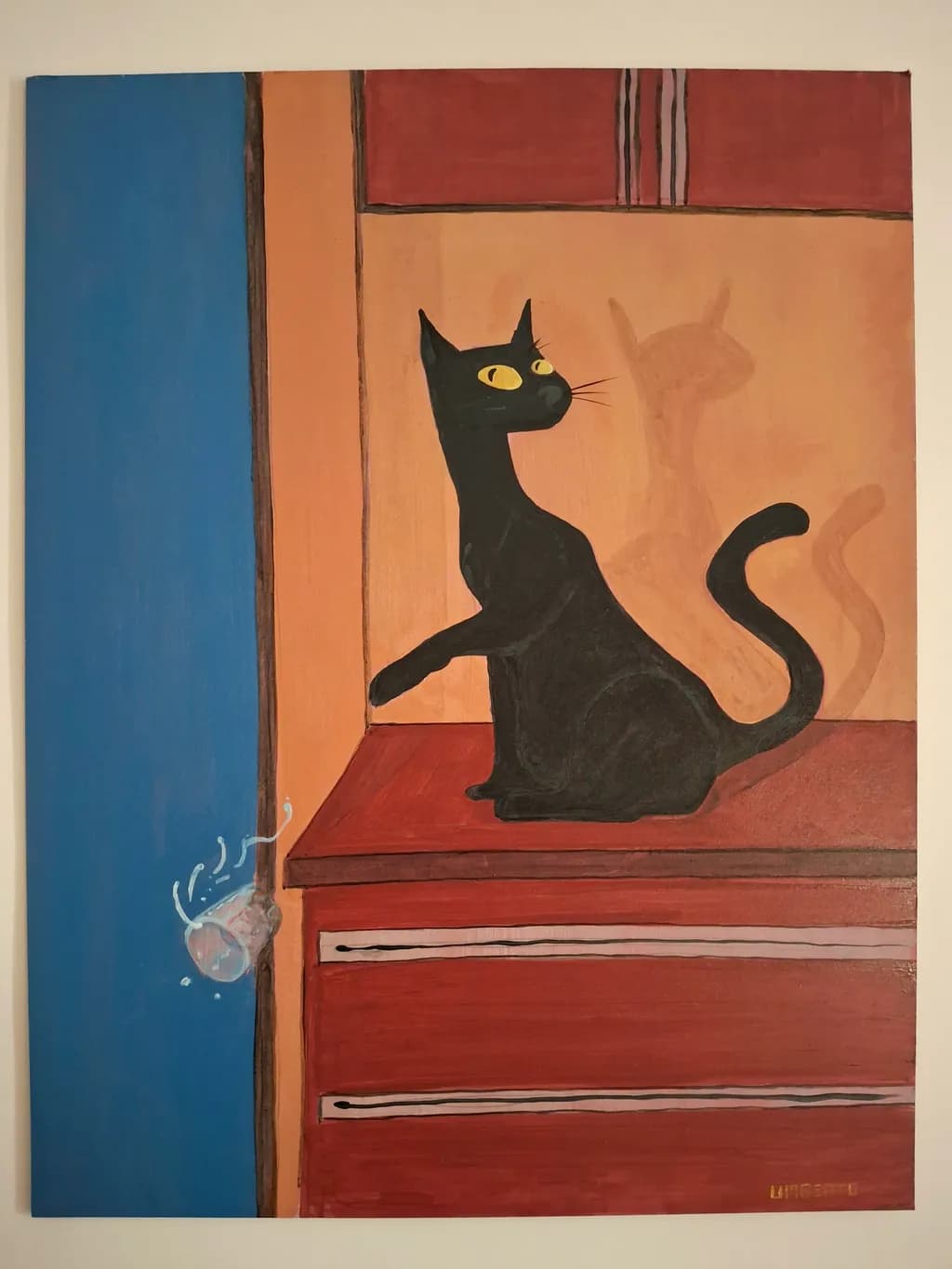 Black Cat on Red Drawer