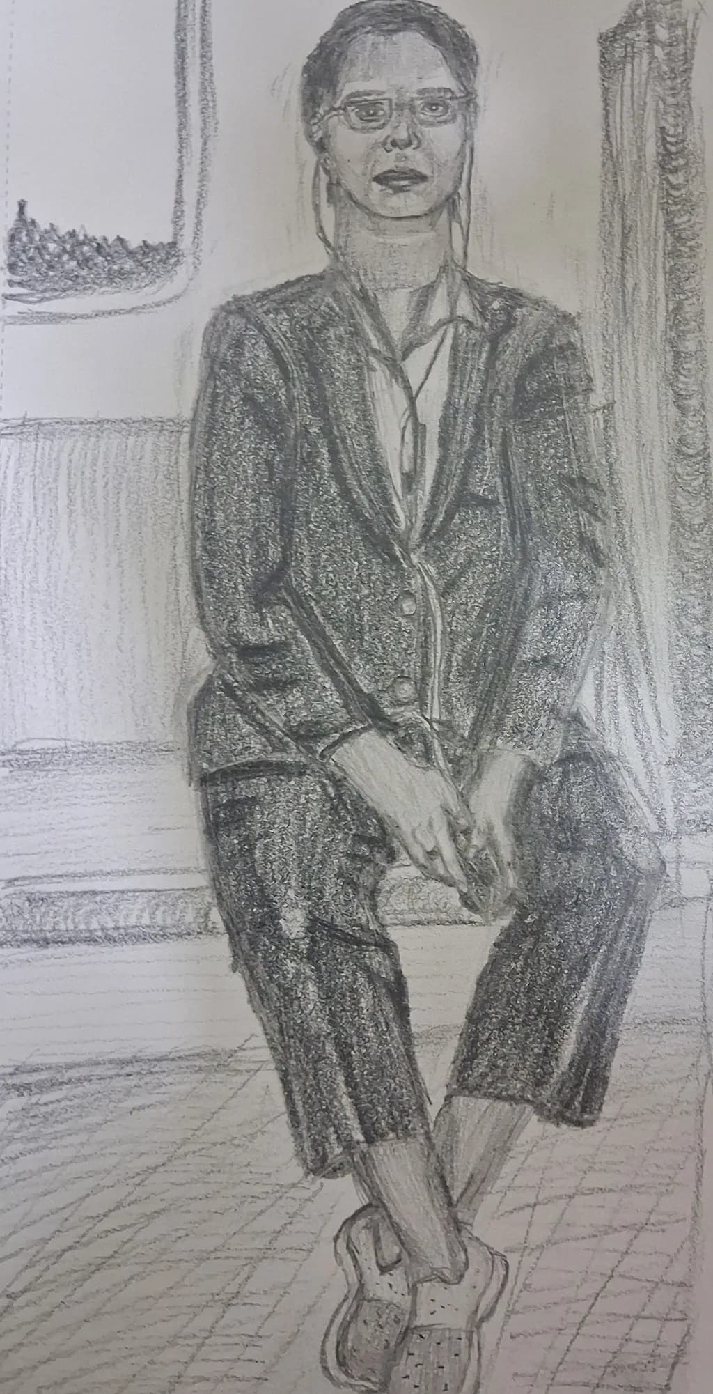 Seated Woman in Suit