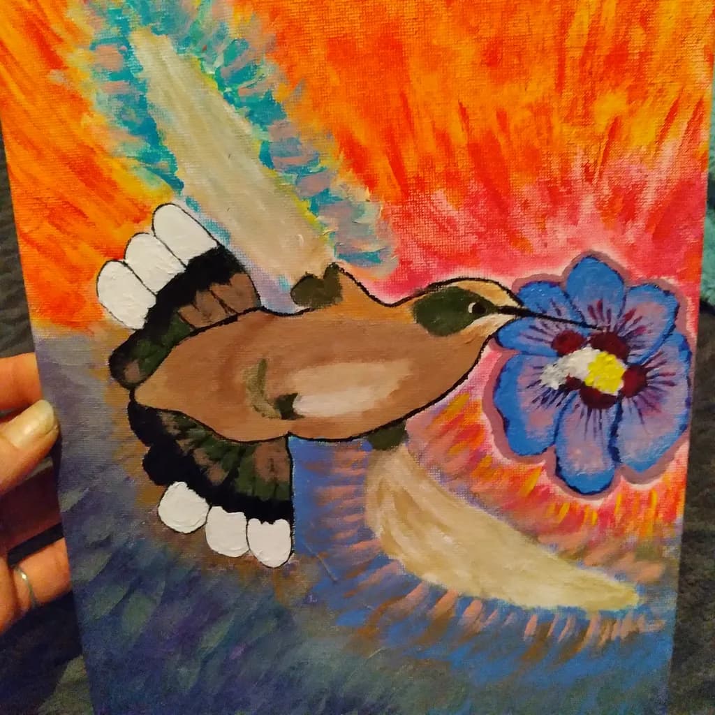 Hand and Blue Flower