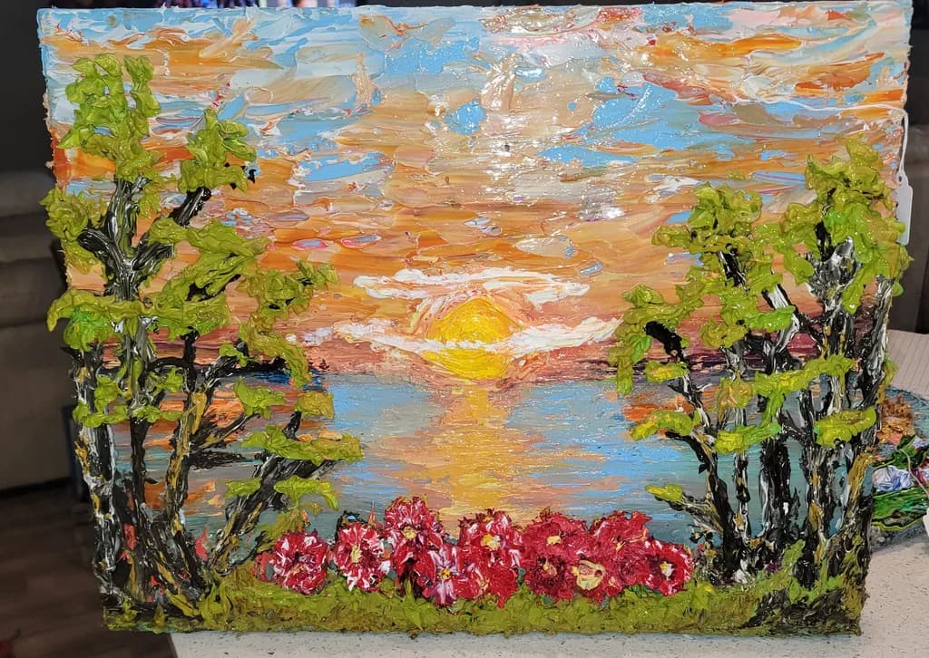 Sunset Over Water with Trees and Flowers