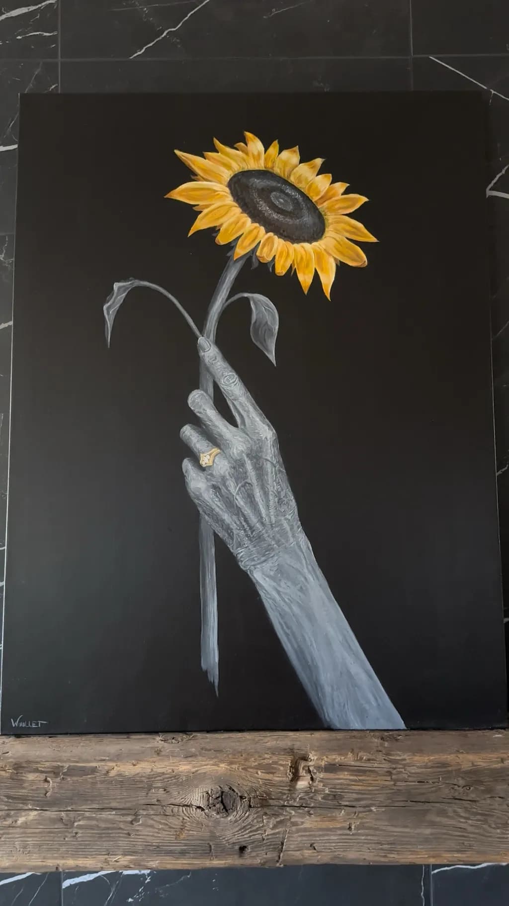 Sunflower and Hand