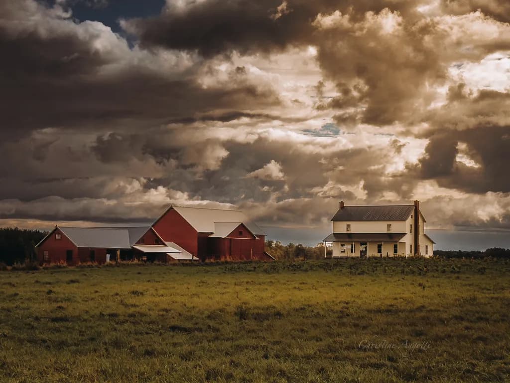 Farmstead Under Storm Clouds