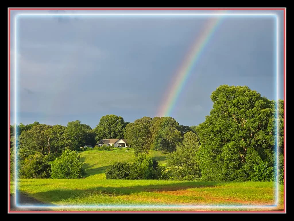 Rainbow Over Landscape