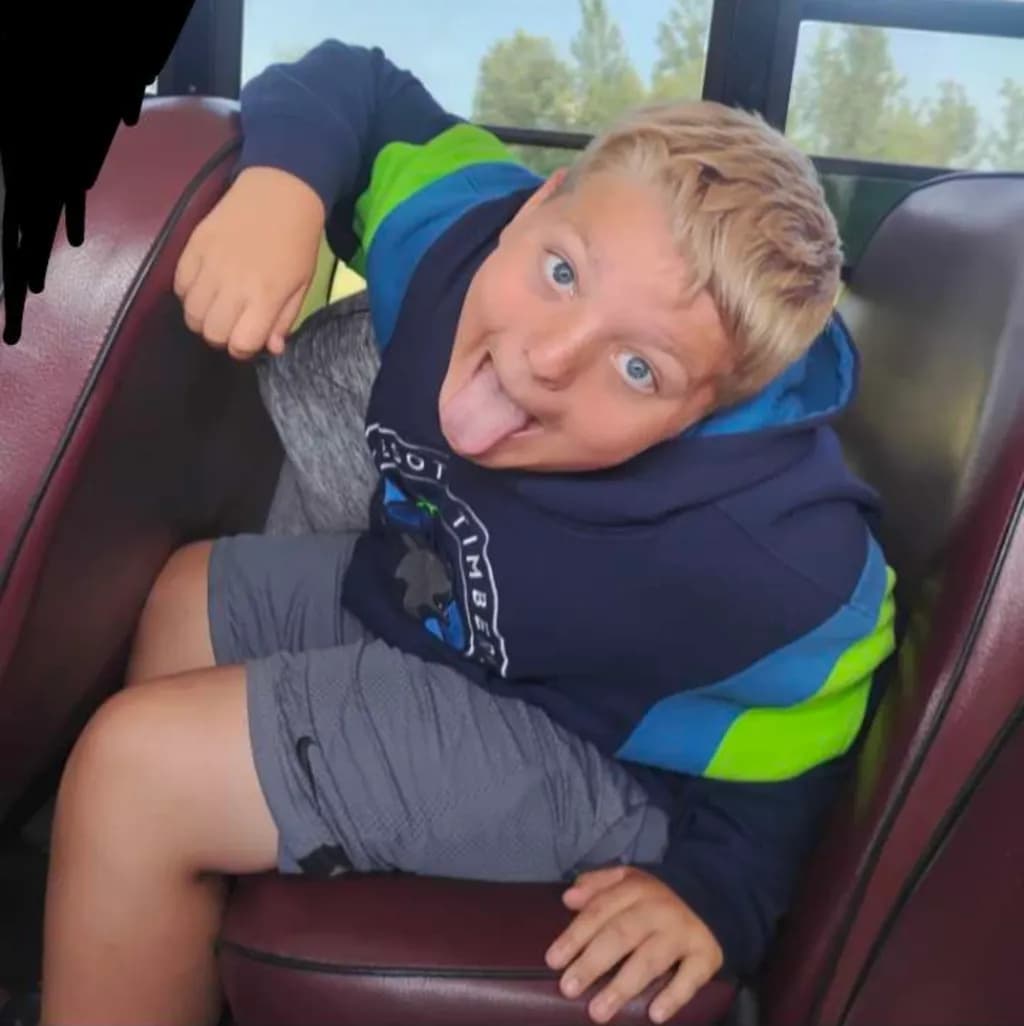 Playful Moment on Bus Seat