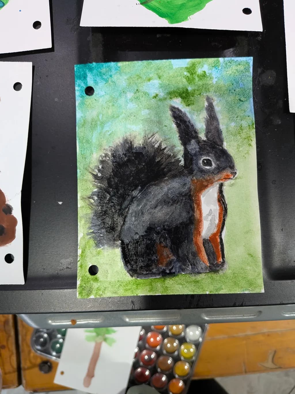 Black Squirrel in Green