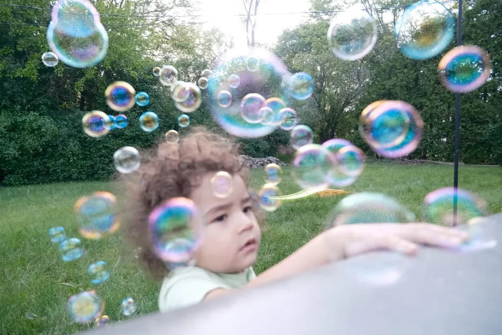 Child and Bubbles Outdoors