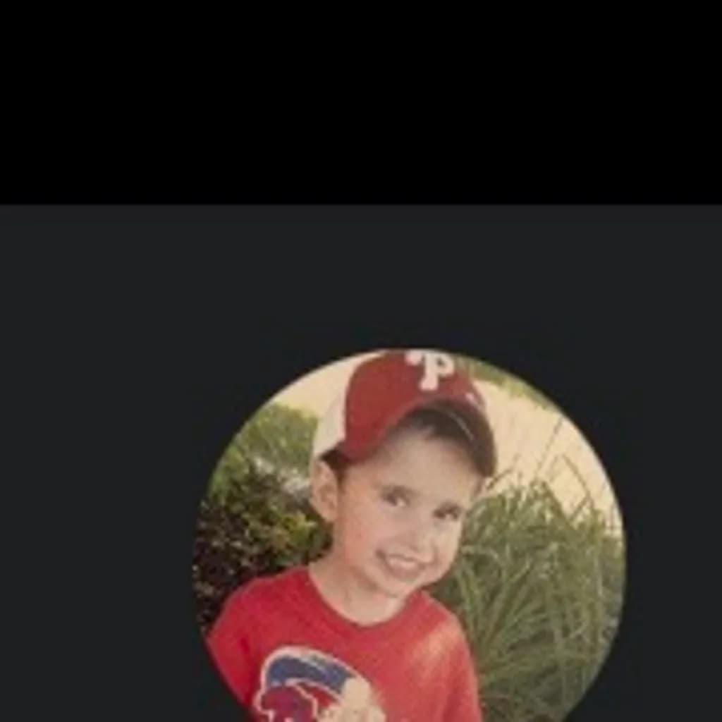 Boy in Red Cap