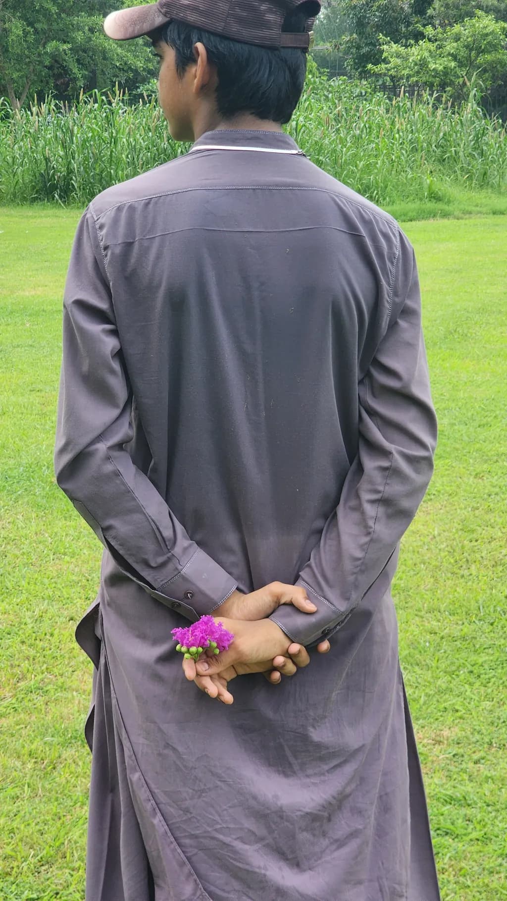 Boy with Purple Flower