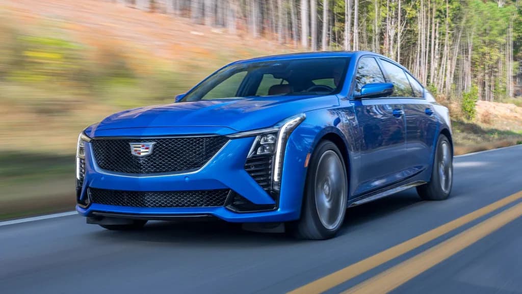 Blue Sedan on Road