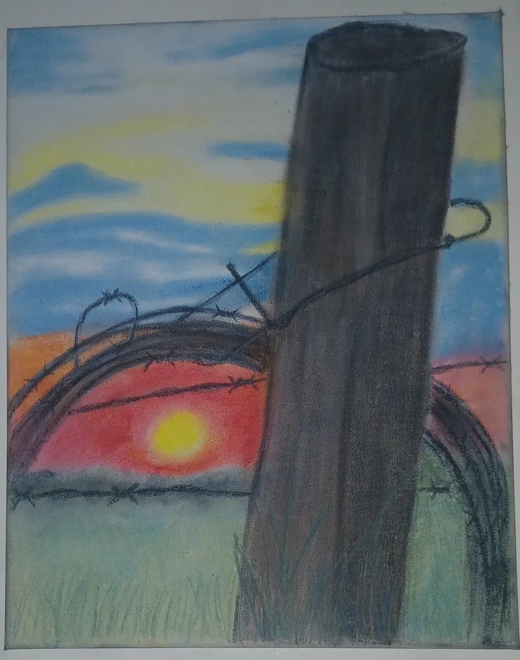 Sunset Beyond Barbed Wire