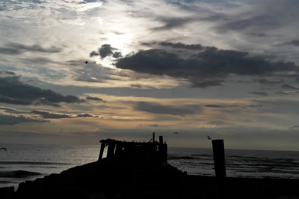Coastal Wreck at Sunset