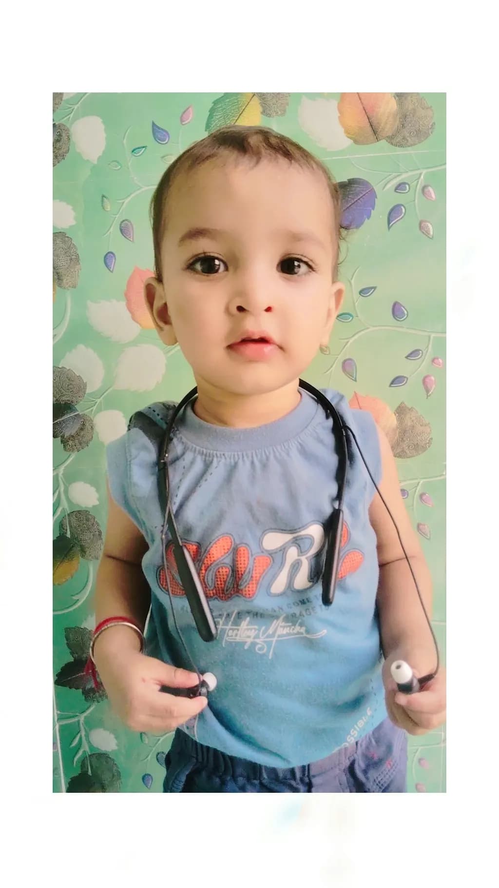 Curious Child with Earphones