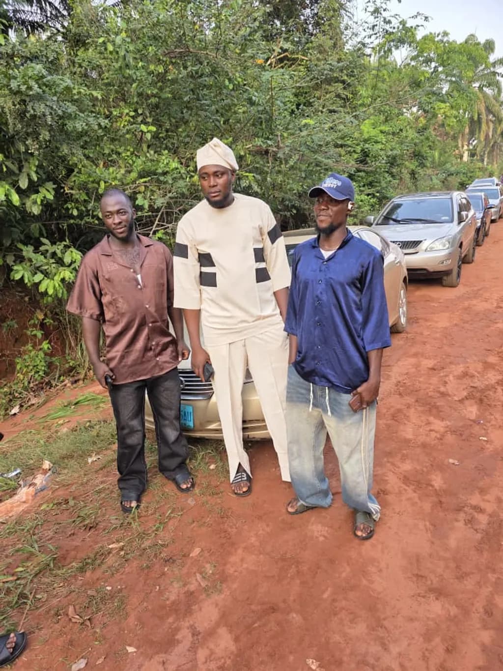 Men on Dirt Road