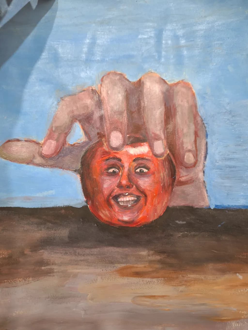 Hand Holding Face Orb