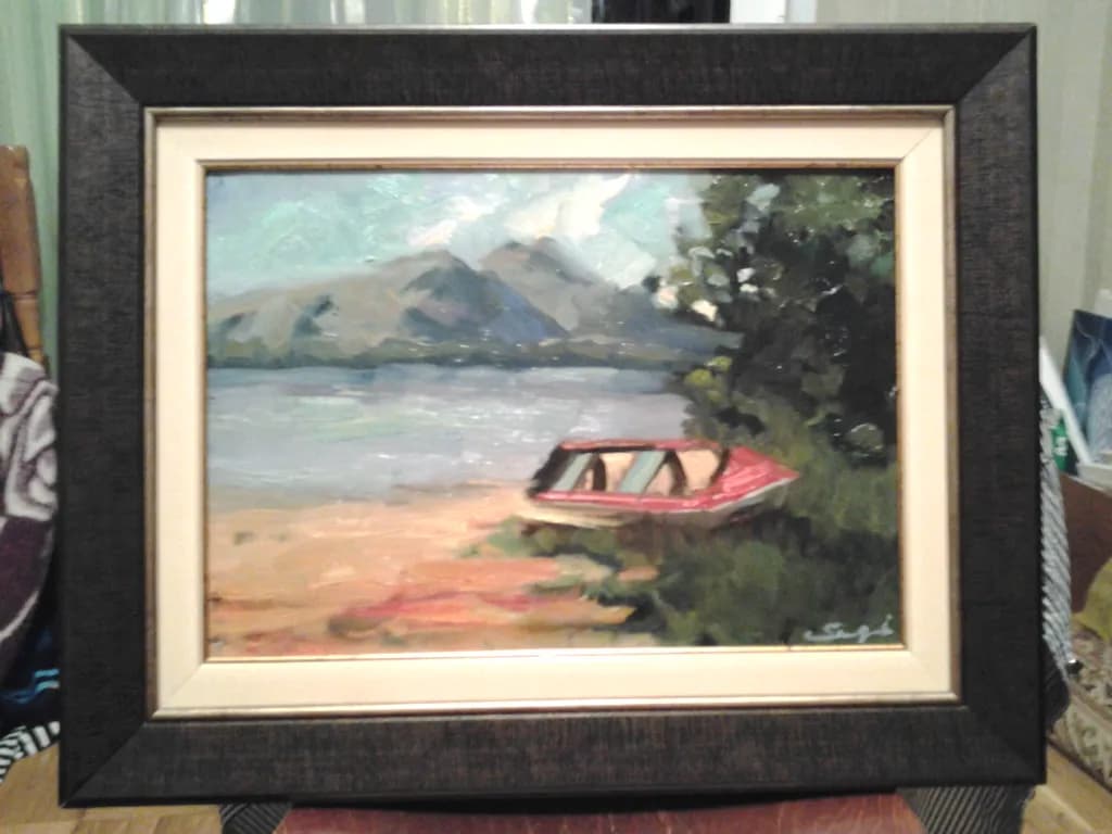 Lakeside Boat and Mountains