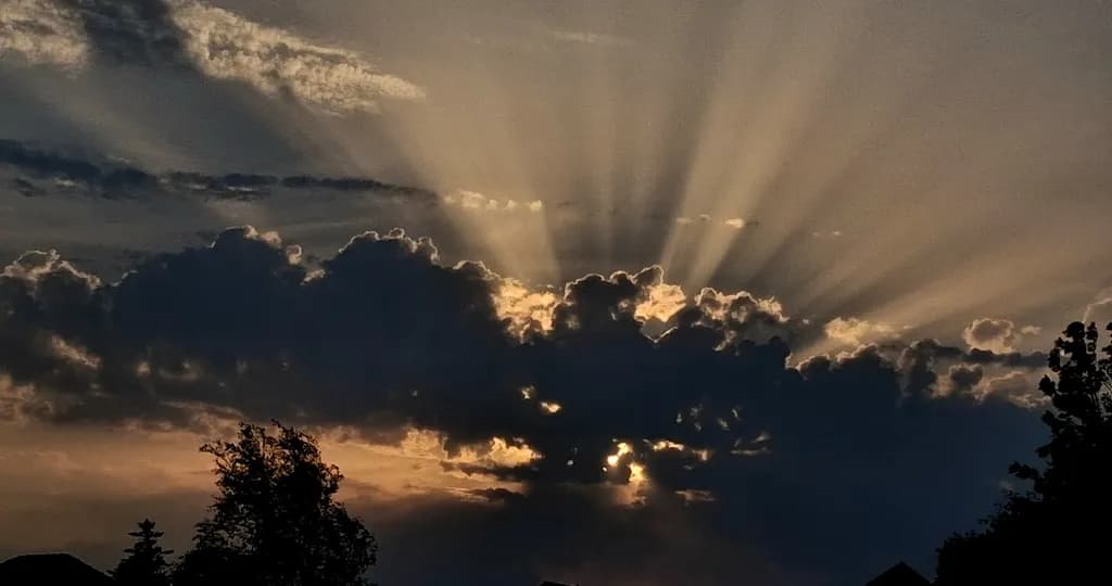 Sun Rays Through Clouds