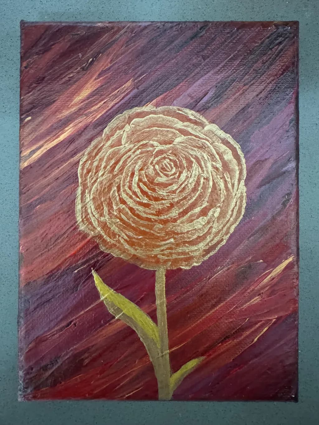 Golden Bloom Against Crimson