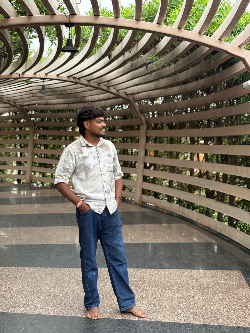 Smiling Man Beneath the Pergola