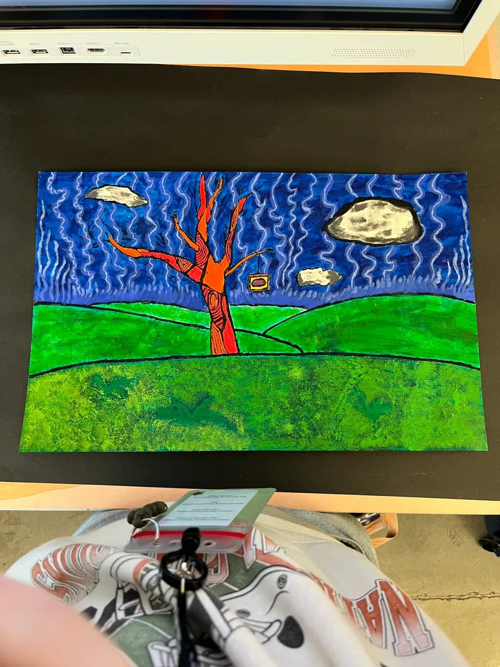 Red Tree Over Green Hills