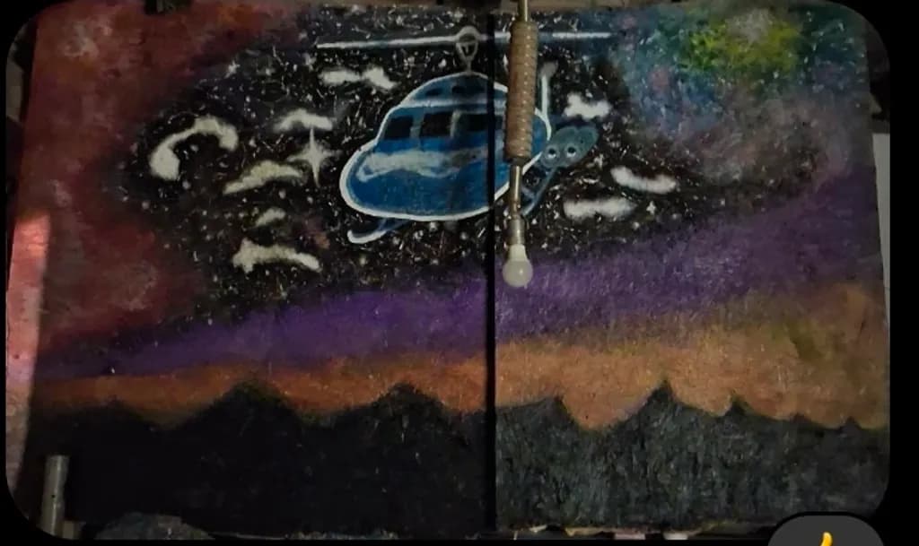 Blue Beetle Over Mountains