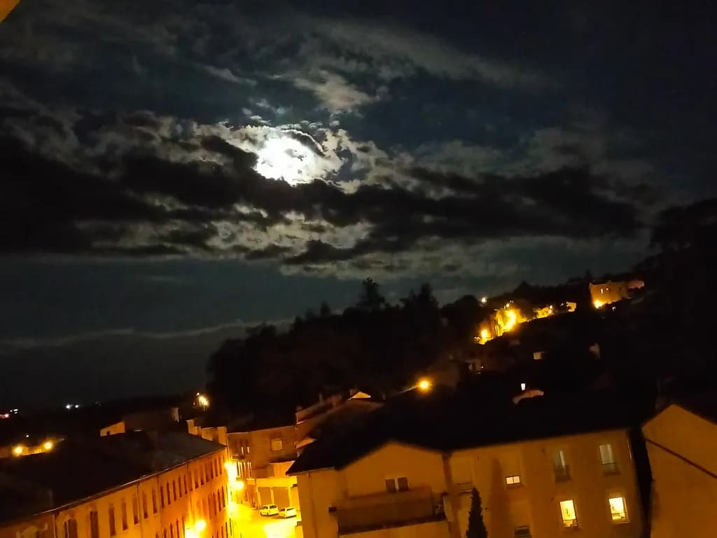 Moonlit Hillside Town