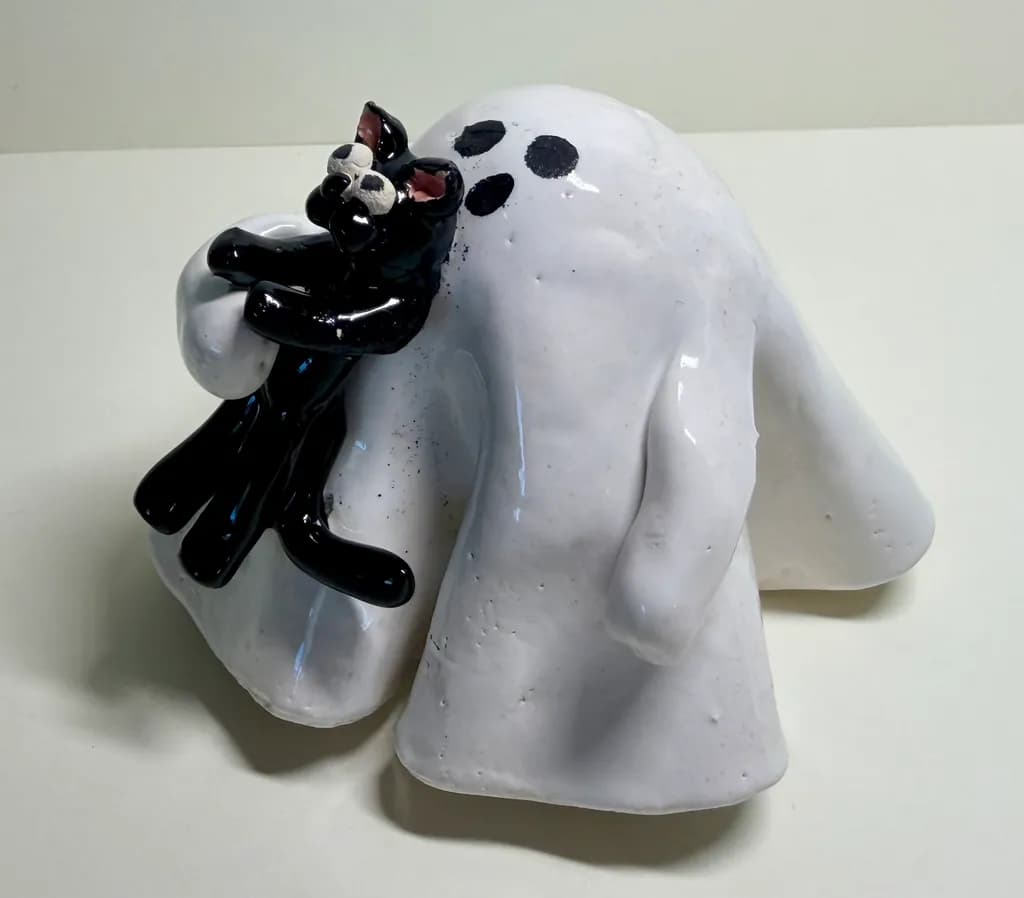 Spotted Cat and Dog Ceramic Sculpture