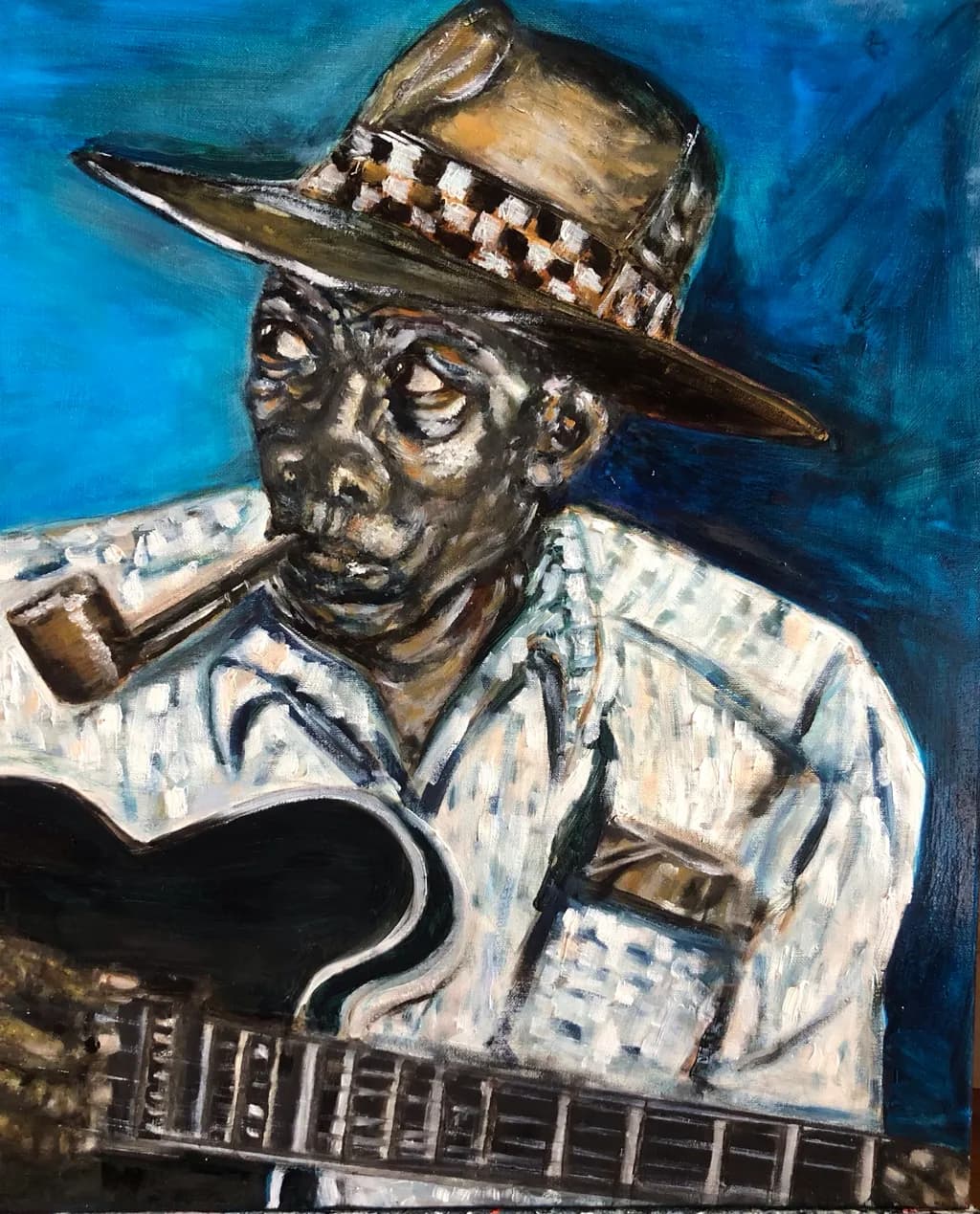 The Hat and Guitarist