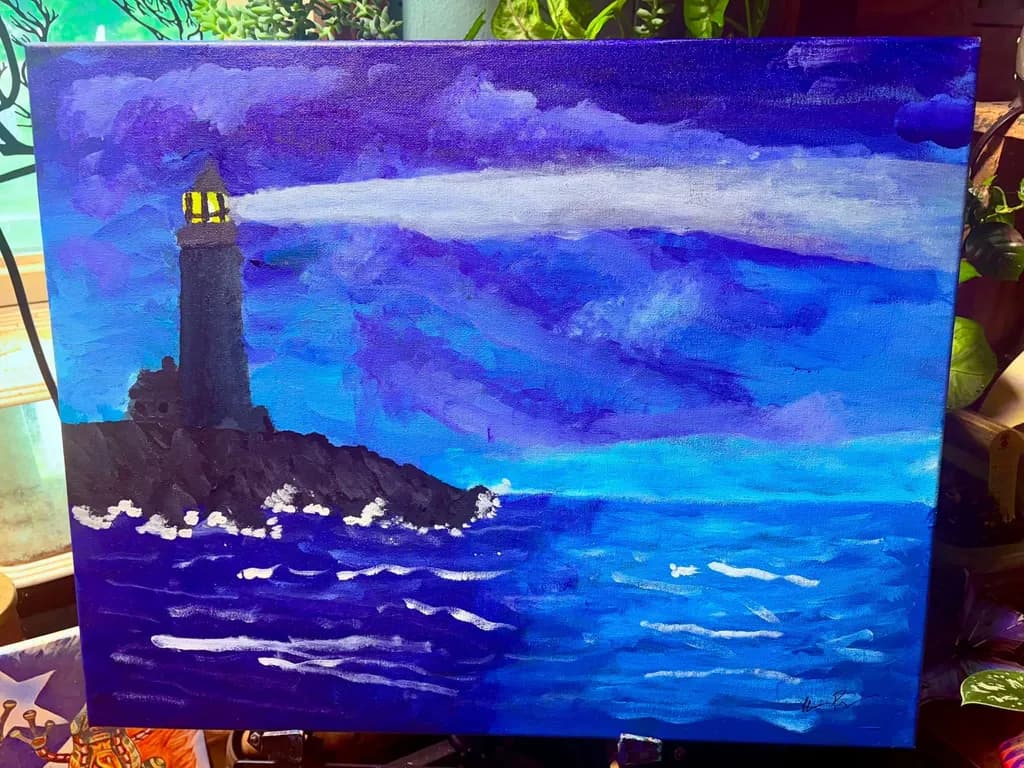 Lighthouse Over Blue Waters