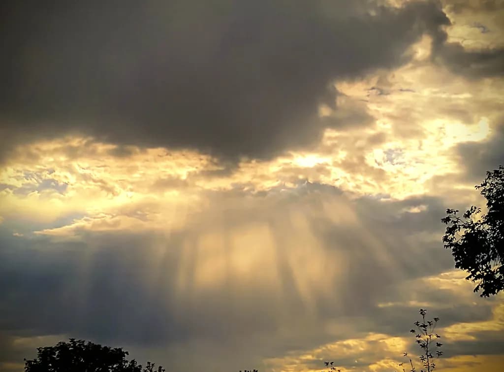 Sunlight Through Storm Clouds