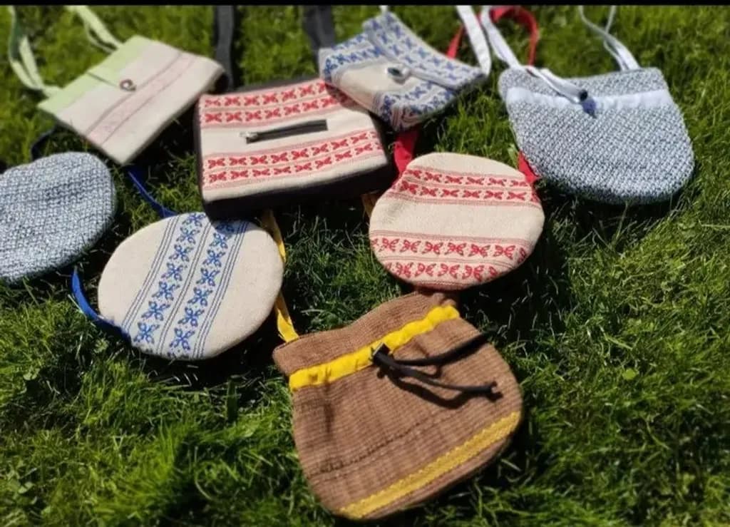 Embroidered Pouches on Grass