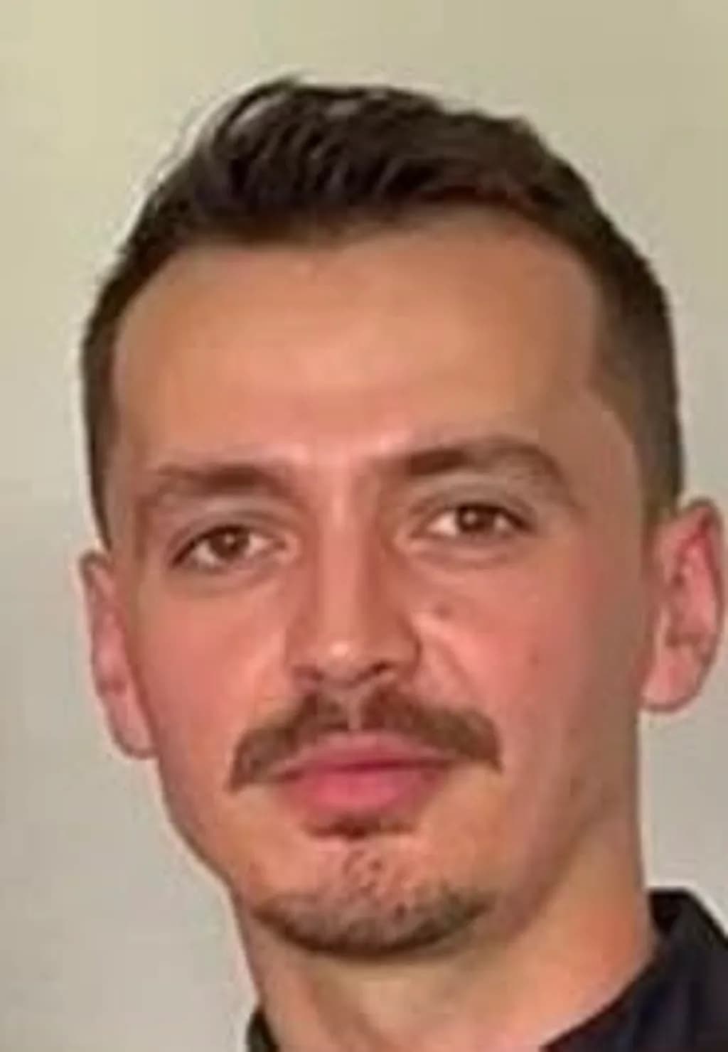 Portrait of a Mustached Man