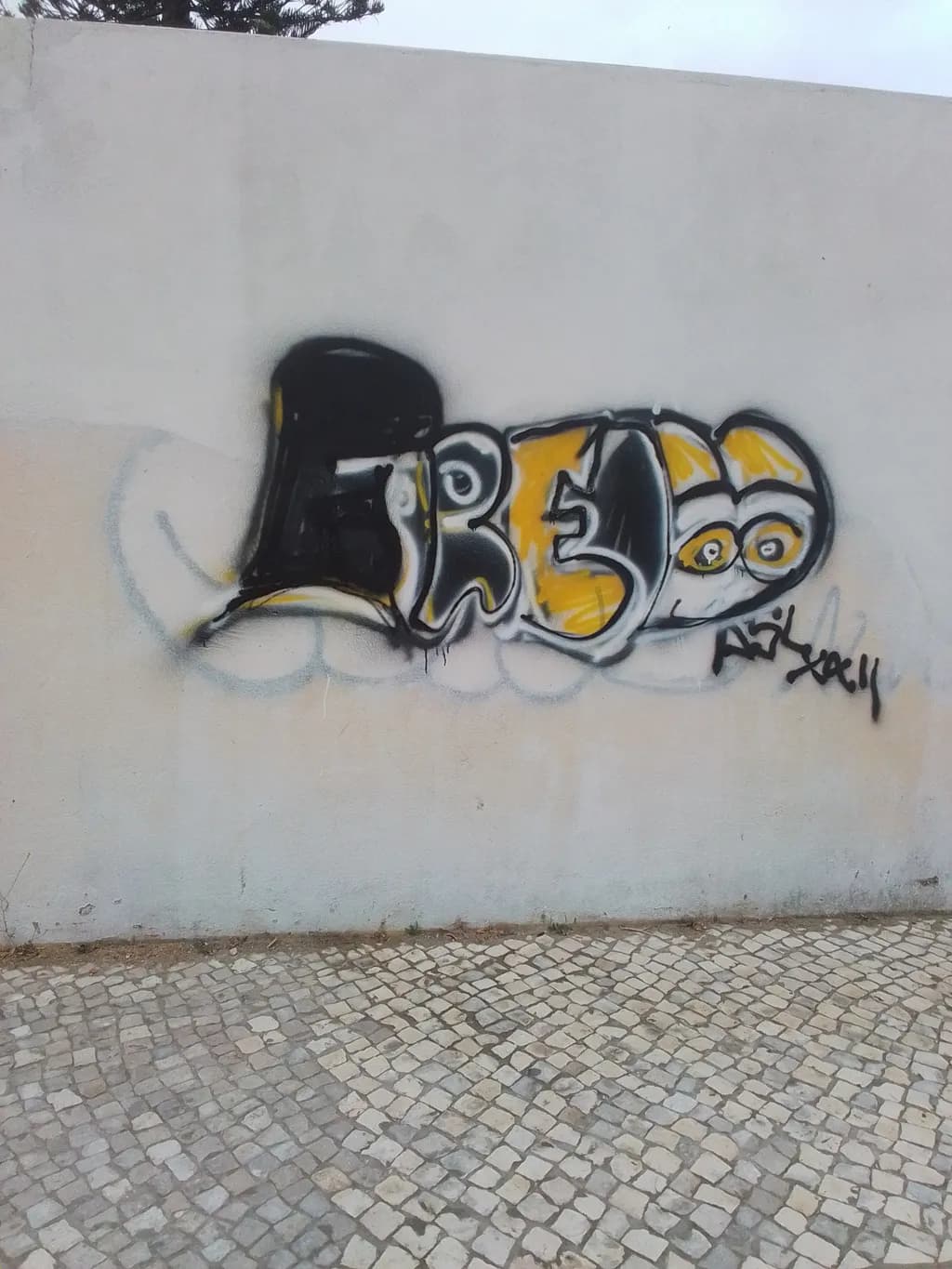 Yellow-Eyed Wall Graffiti