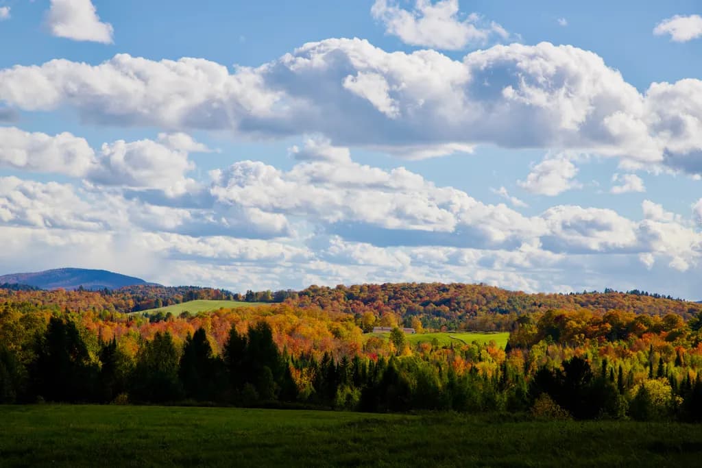 Autumn Hills Under Clouds