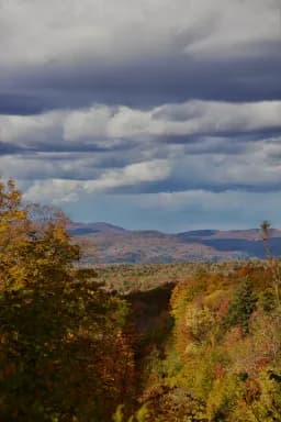 Autumn Mountains Under Storm Clouds