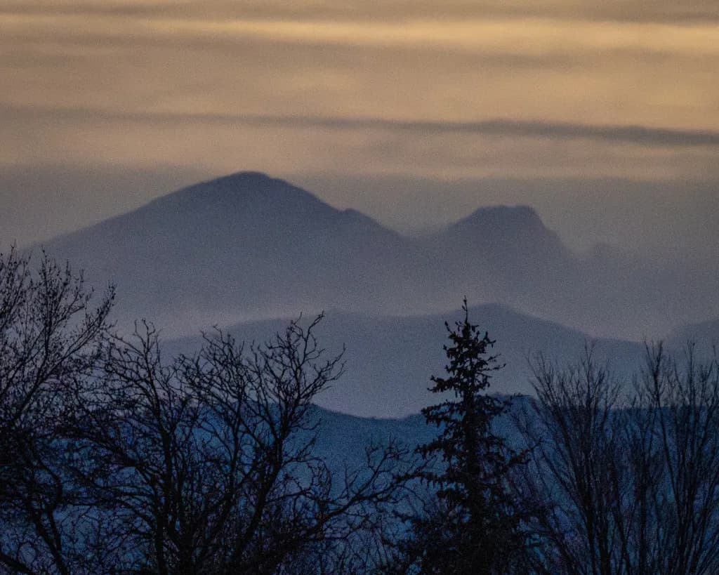 Twilight Mountain Forest Obscured By Smoke Filled Skies