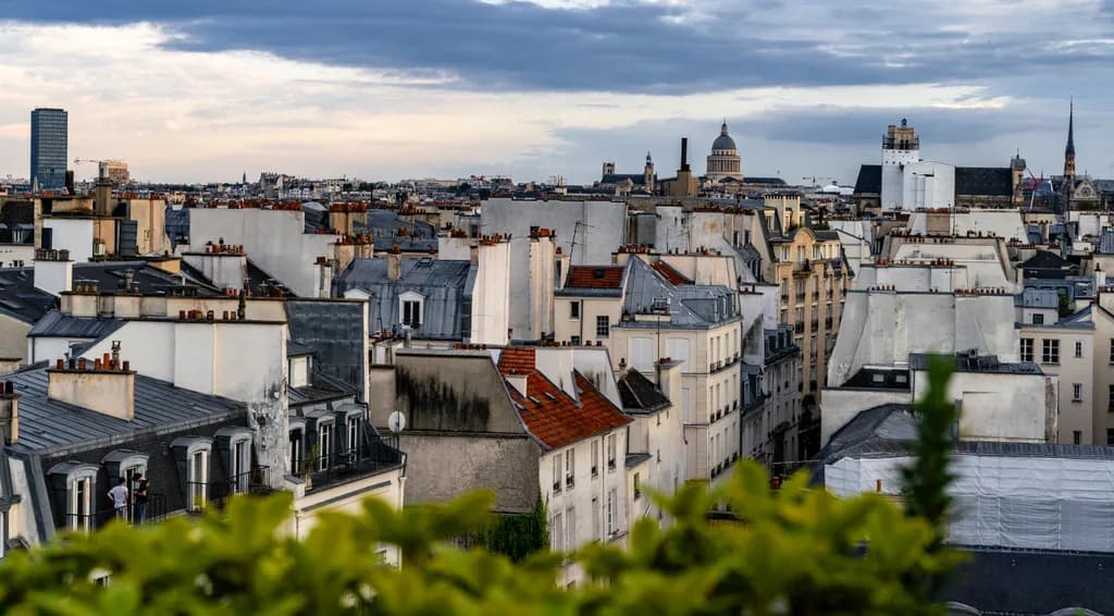 Paris Rooftops Under Stormlight