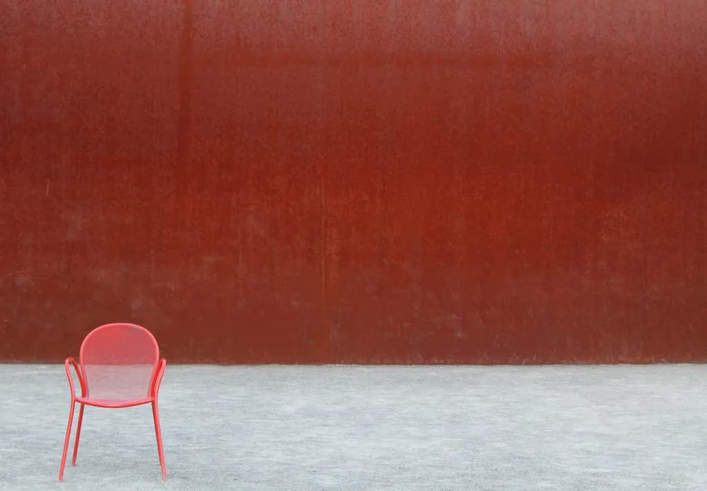 Red Chair, Empty Wall