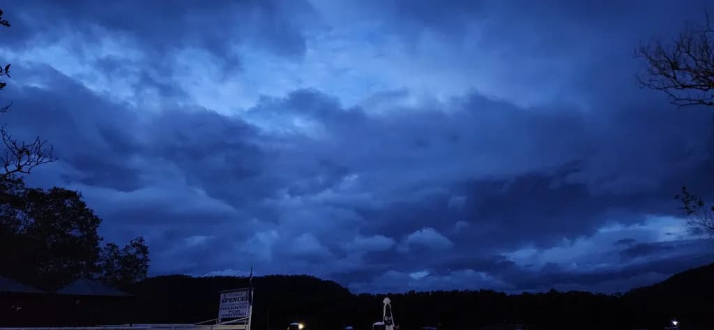 Blue Storm Over Hills