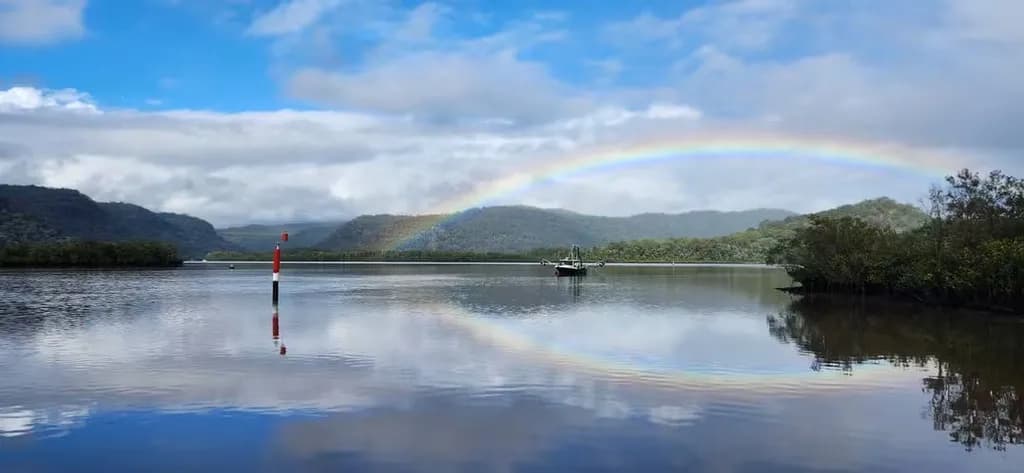 Rainbow Over Mountain Lake