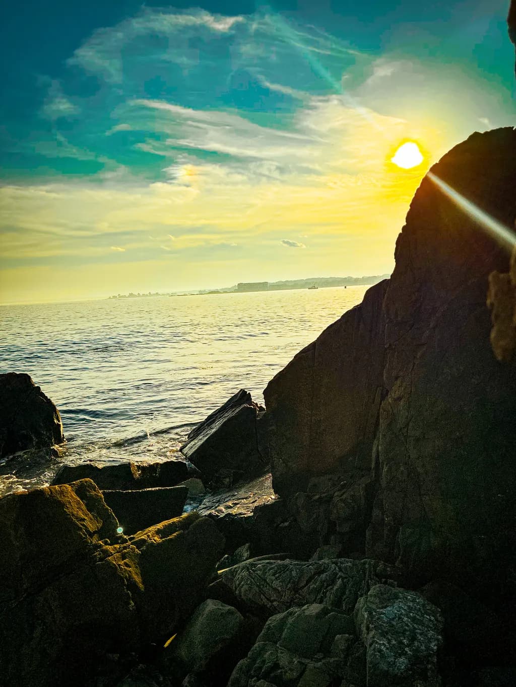Sunset Over Rocky Shore
