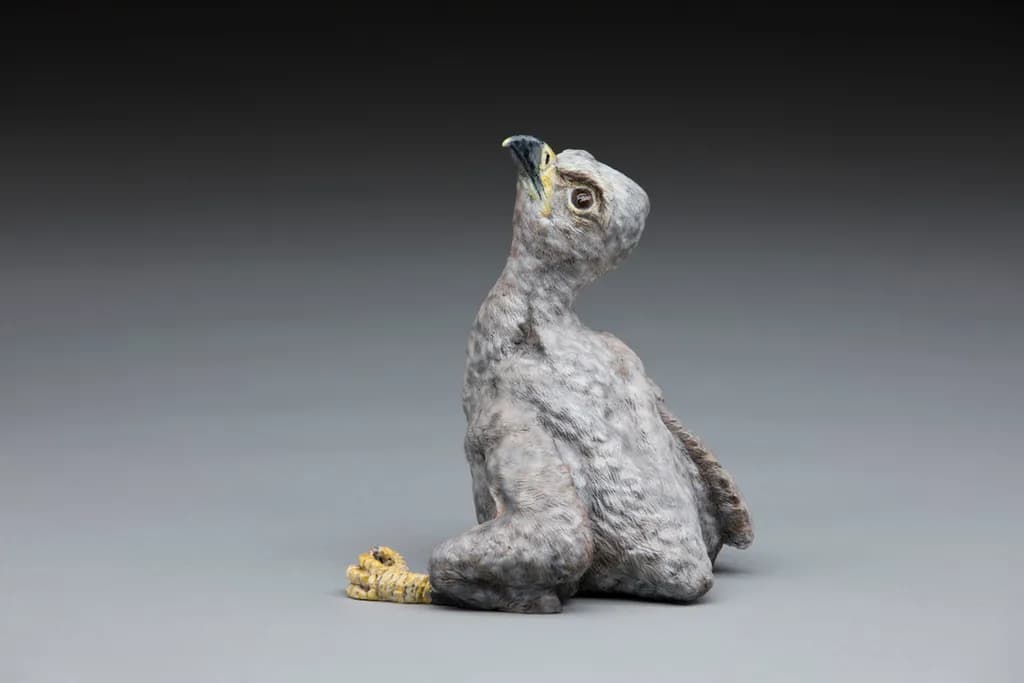 Whimsical Guardian: A Captivating Sculpture of Nature's Majesty