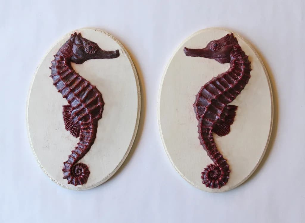 Seahorse Serenade: A Dual Relief Sculpture in Rich Burgundy and Cream