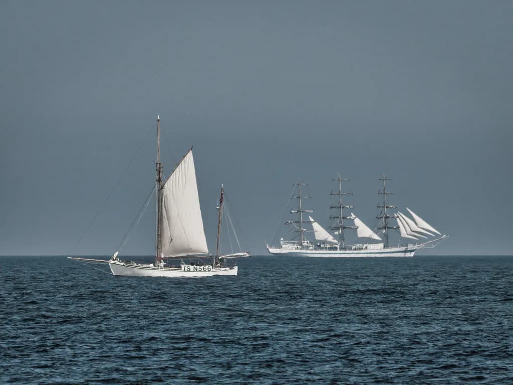 Gaff Ketch and Ship at Sea